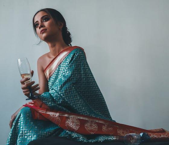 Indian woman at a curated social event